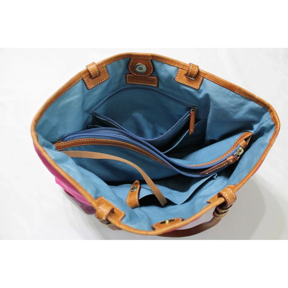 Dooney & Bourke feet crafted compartment